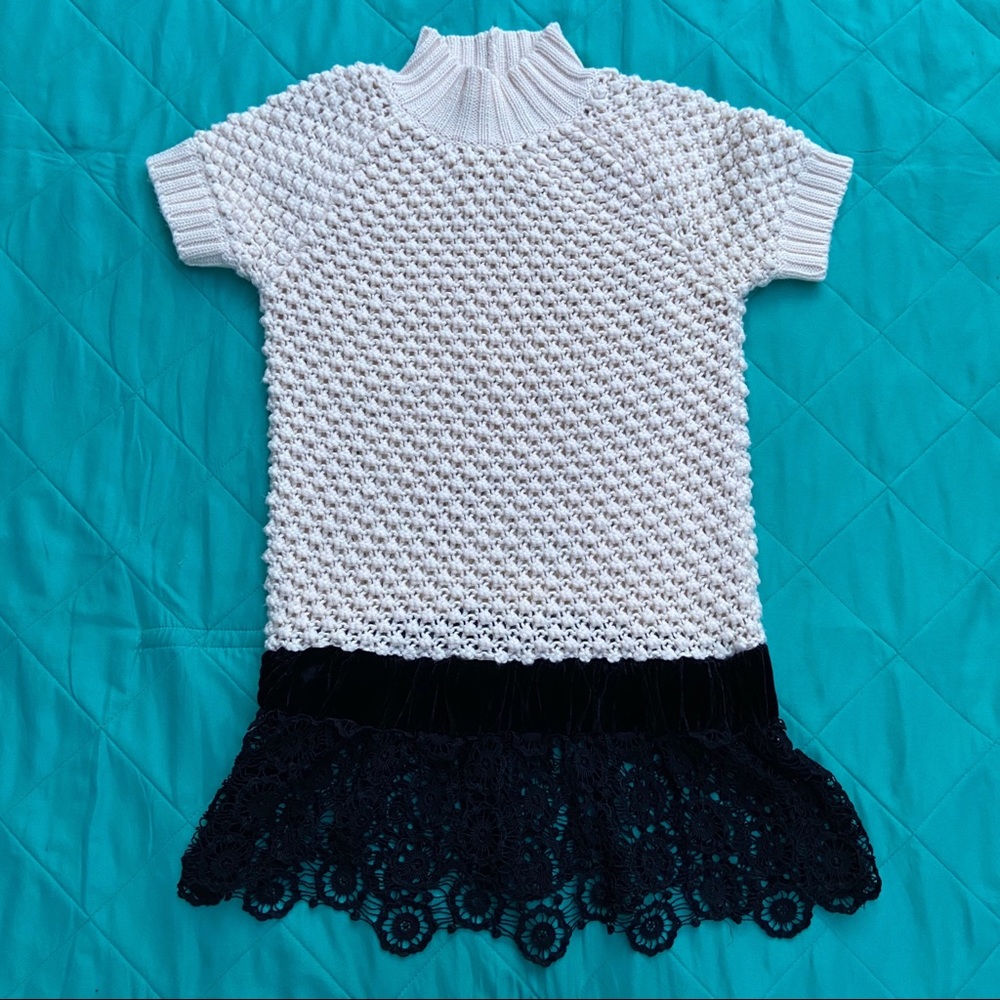 Elegant White and Black Turtleneck Sweater